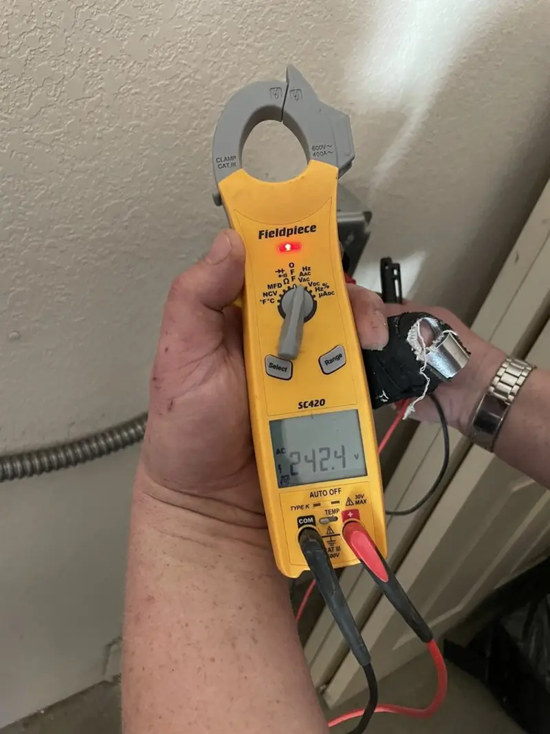 Voltage testing with clamp meter during Generator Installation in Crestwood
